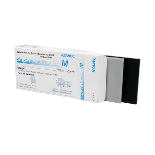 A box of Kevax Super Assflex Pad M adhesive pads shown on a white background, with one black pad partially pulled out of its packaging.